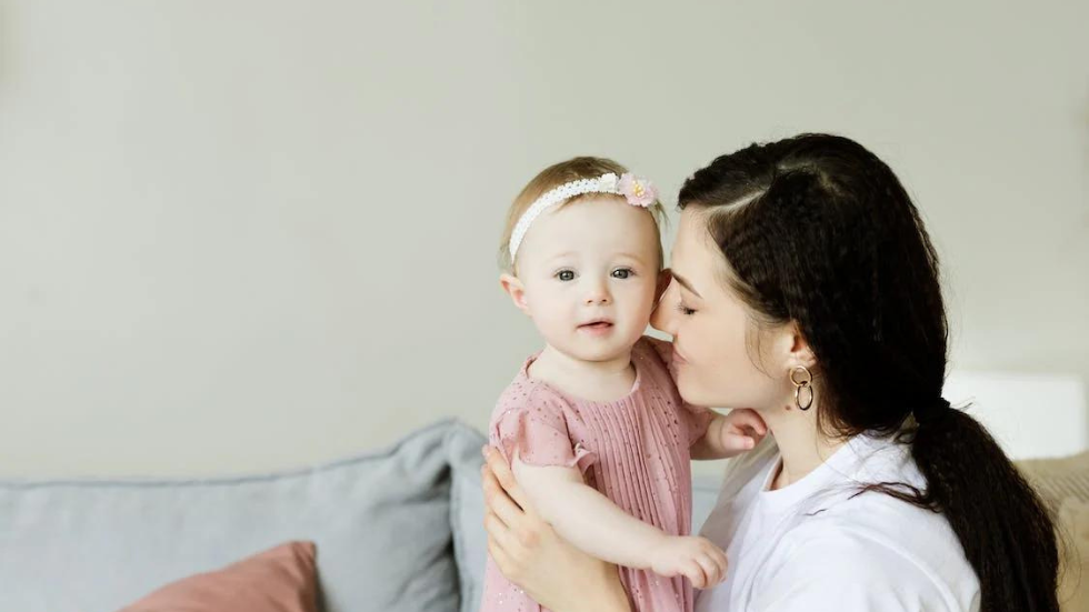 woman holding a child